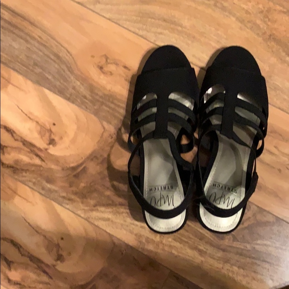 Black elastic Impo high heels.